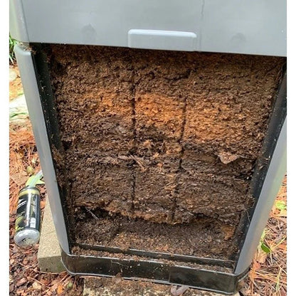 Inside of a hot grey compost bin showing compost
